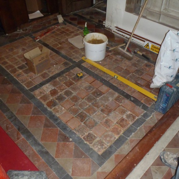 Sandridge church, tiles being re-laid, including replacements