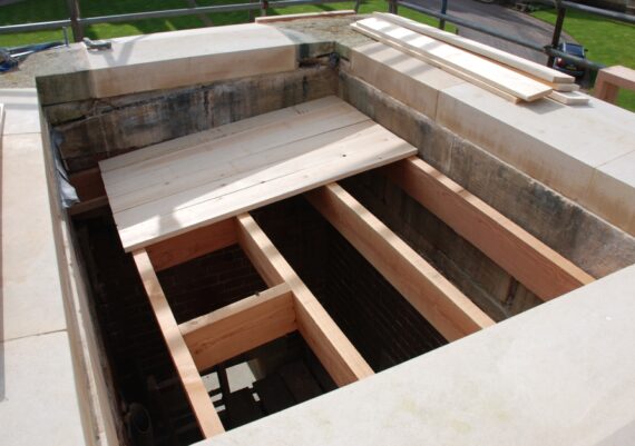 Harlaxton Front Circle, new roof structure being built, stone repairs complete, to gate lodge