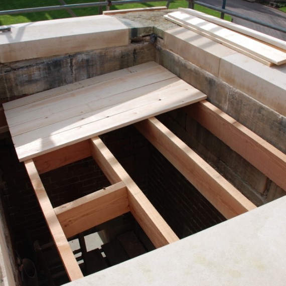 Harlaxton Front Circle, new roof structure being built, stone repairs complete, to gate lodge