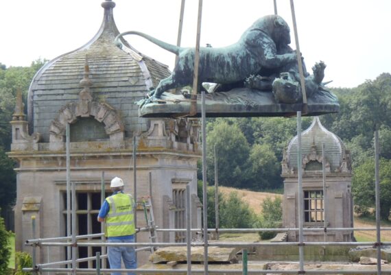 Harlaxton Front Circle, lion being lifted